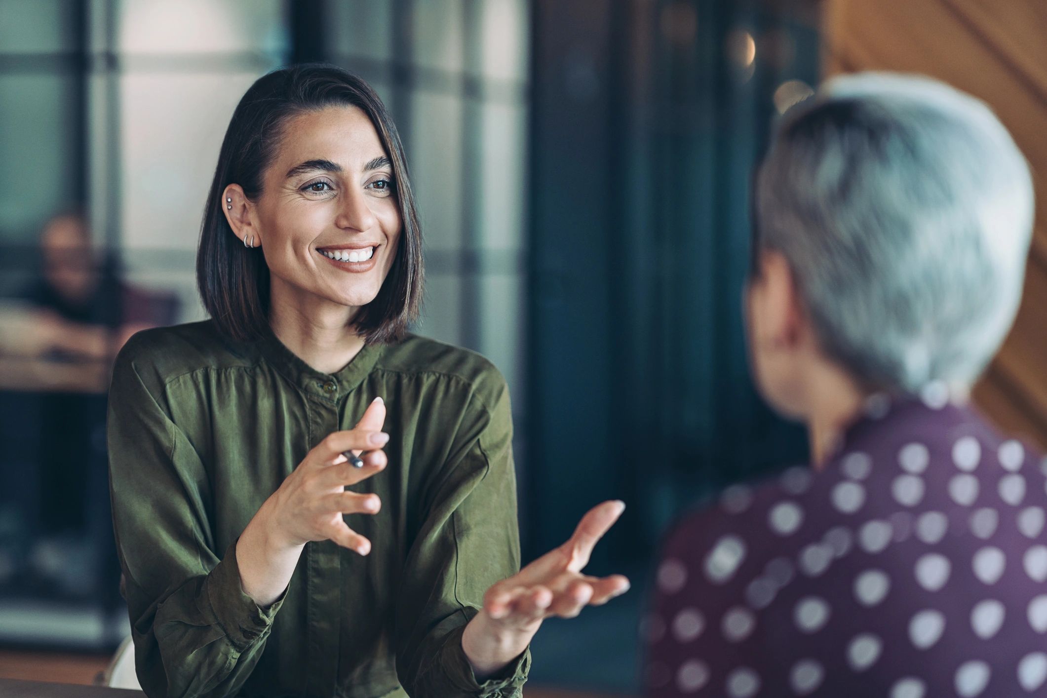 Coach meeting with a client in an office