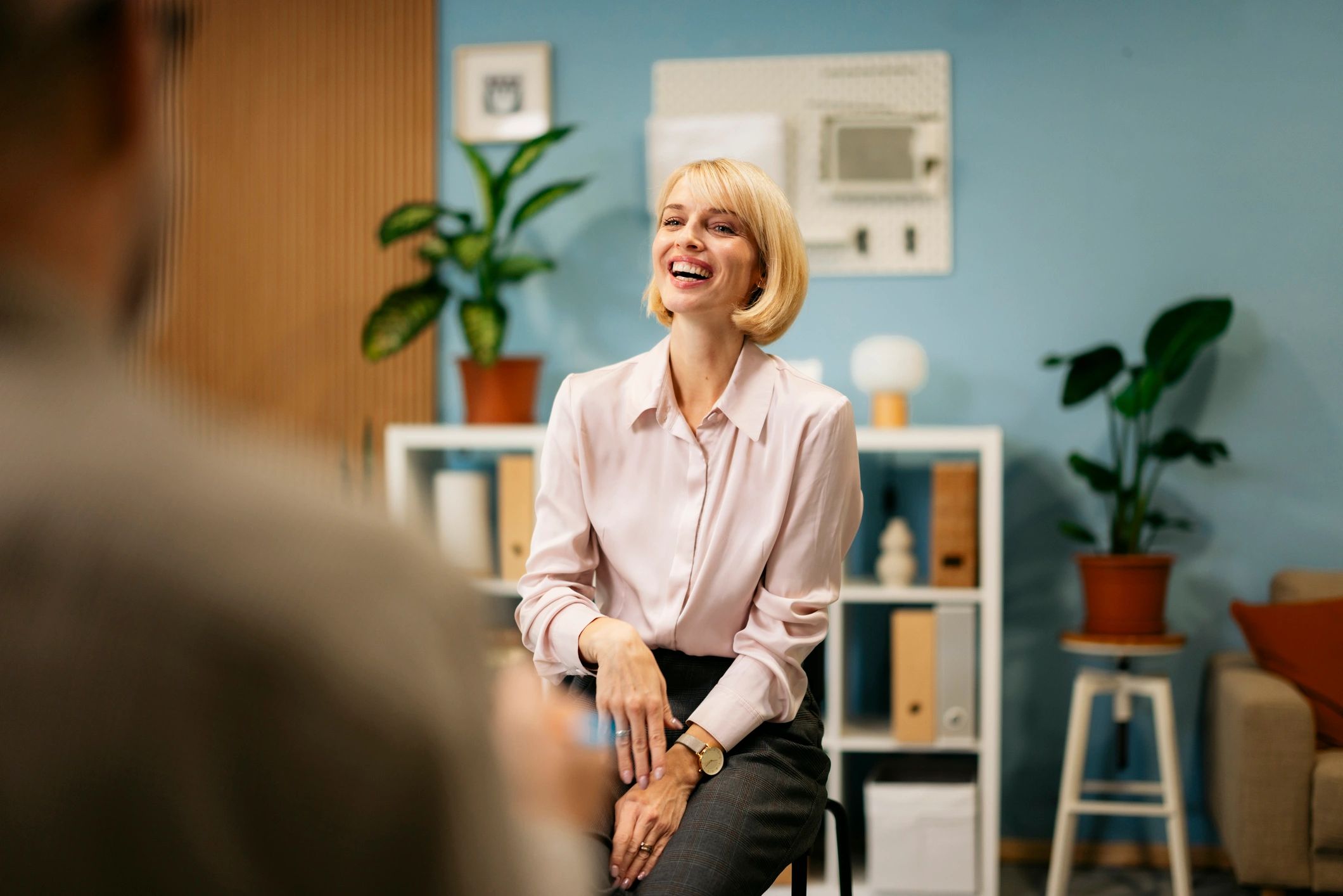 Coach in conversation during a supportive professional session